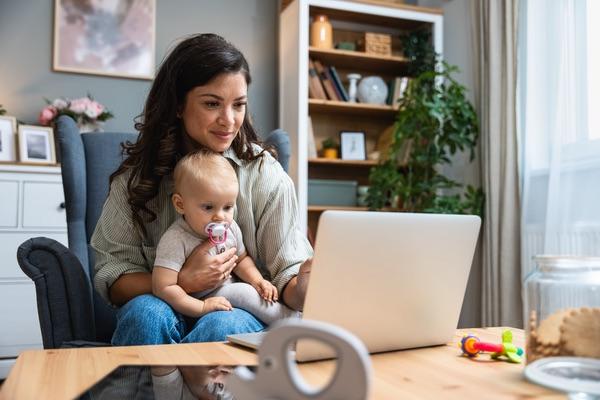 Mother and baby looking a computer screen